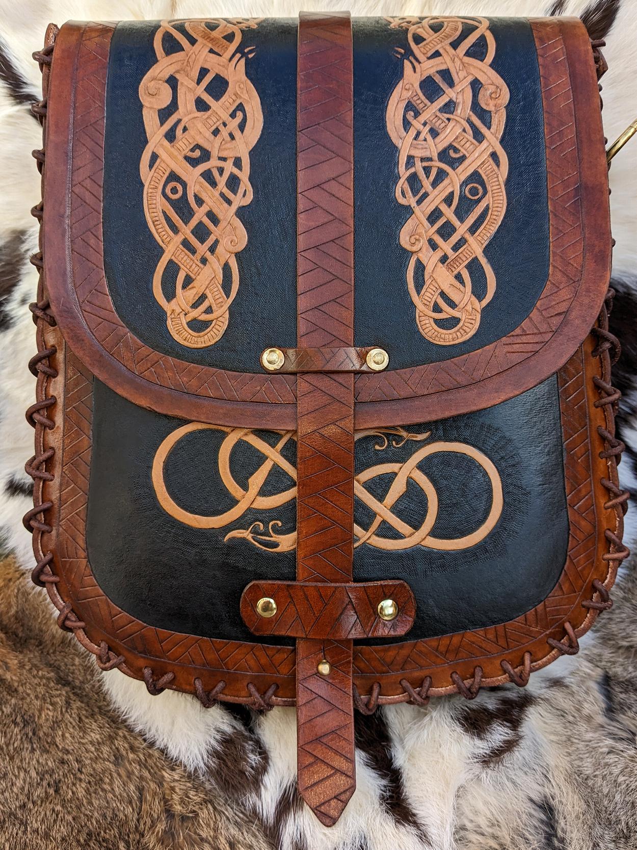 Hand crafted leather statue with Celtic styling